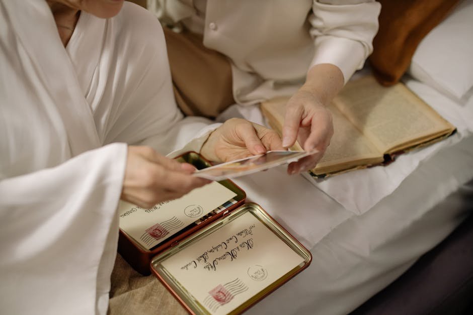 Two adults hold old photos, evoking nostalgia and timeless love.